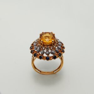A Ring with Golden Topaz, Sapphires and zircons