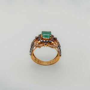 Emerald ring with zircons