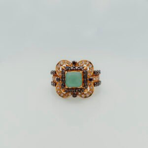 Emerald ring with zircons