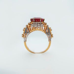 A ring with Ruby and zircons