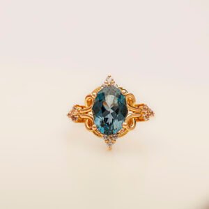 Royal Midnight – 21k Gold Ring with London Blue Topaz & Zircons