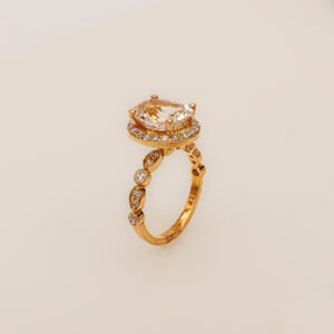 Celestial Glow – 21k Gold Ring with Skardu Topaz & Zircons