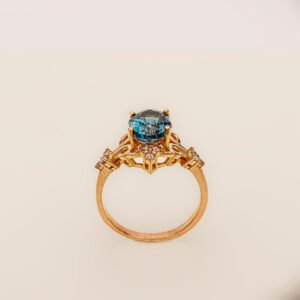 Royal Midnight – 21k Gold Ring with London Blue Topaz & Zircons