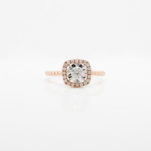 A radiant diamond halo set in luxurious 18K gold